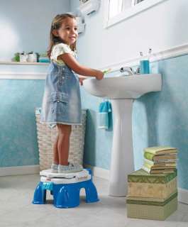 This potty doubles as a step stool for children to use as they brush 