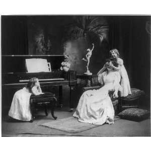  Who is it?,c1900,piano,young woman with children: Home 