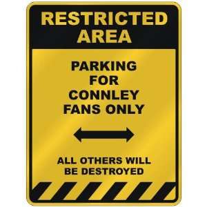  RESTRICTED AREA  PARKING FOR CONNLEY FANS ONLY  PARKING 