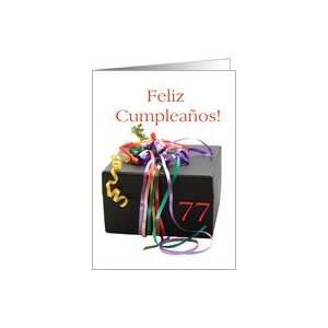 77th birthday gift with ribbons   Feliz Cumpleaños   Spanish card 