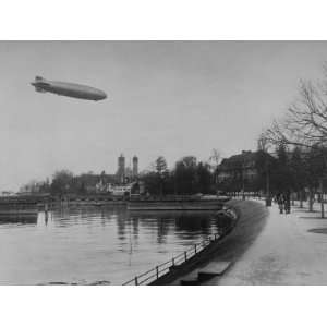 The Hindenburg Airship of Zeppelin Design Flying over City Where it 