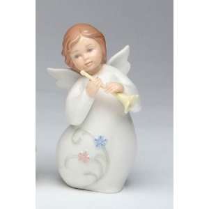   Little Angel Statue With Flowers Playing A Trumpet: Home & Kitchen