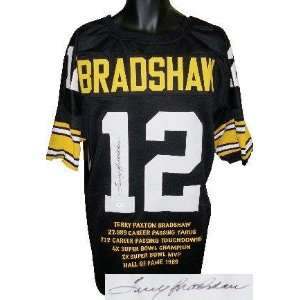 : Terry Bradshaw Signed Uniform   Black Prostyle w Embroidered Stats 