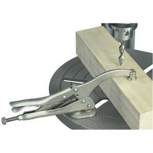 Drill Press Locking Clamp Secures Work Pieces  
