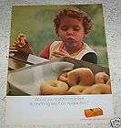 1973 Kodak Film CUTE boy eats donuts doughnuts ​1page AD