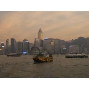 Chinese Style Tourist Boat Sails in Victoria Harbour, Hong Kong, China 